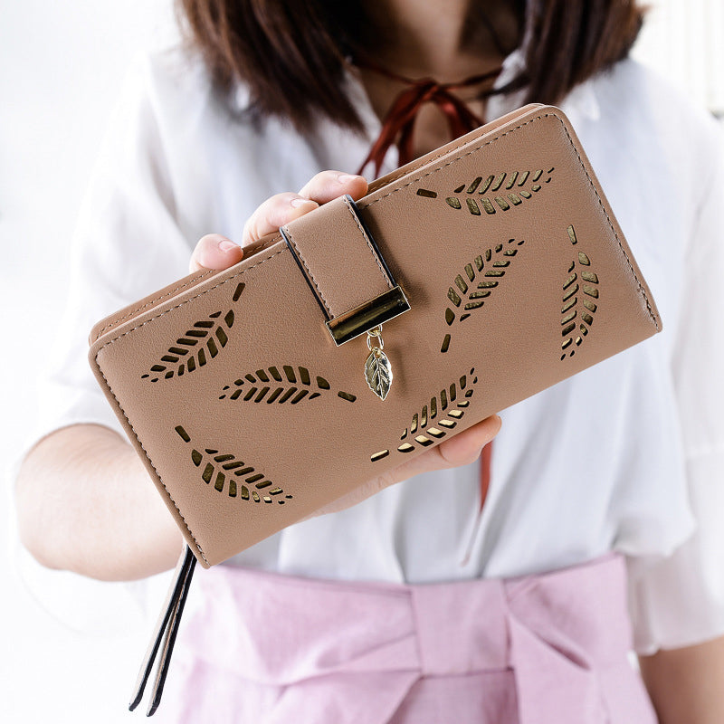WOMEN'S WALLET WITH CUT-OUT DESIGN